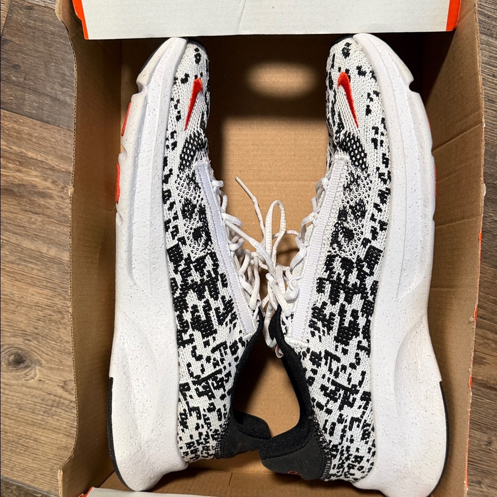Nike Black and White Sneakers with Red Details